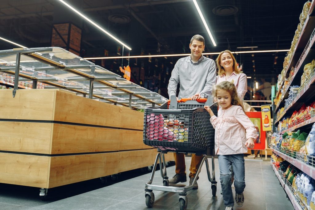 Family Doing Shopping in the Grocery Store