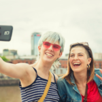 two queer women taking a selfie